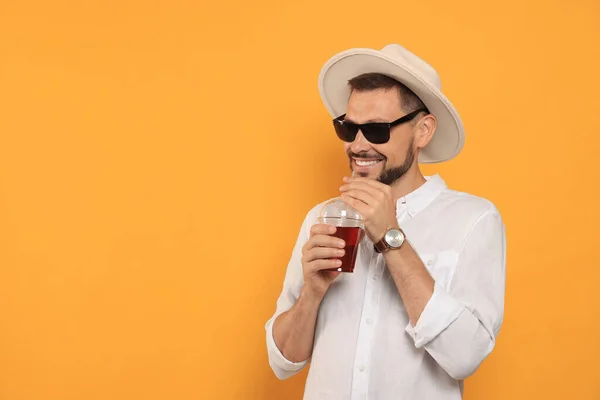 Man Drinking Delicious Juice Orange Background Space Text — Stock Photo, Image