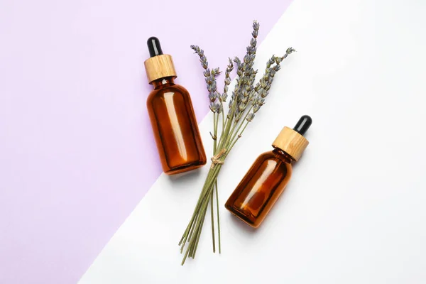 Bottles Face Serum Beautiful Flowers Color Background Flat Lay — Stock Photo, Image