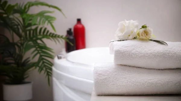 Stacked Bath Towels Beautiful Flowers Table Bathroom Space Text — Stock Photo, Image