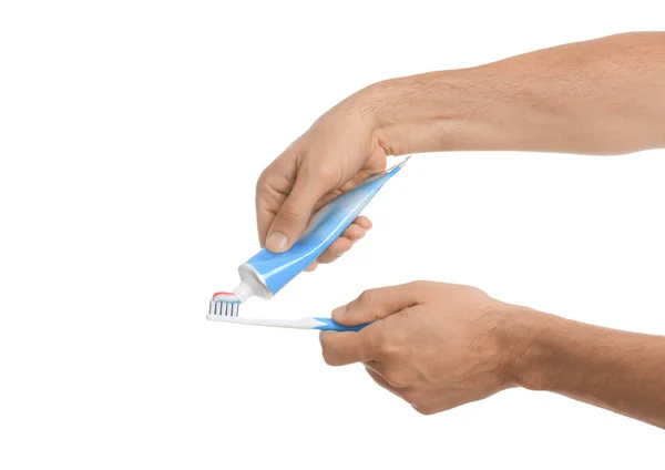 Man Applying Toothpaste Brush White Background Closeup — 图库照片