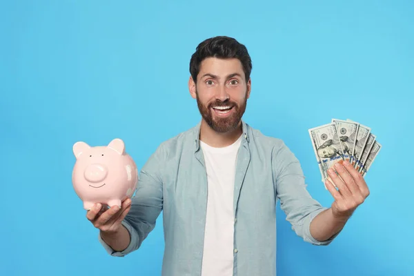 Happy Man Money Ceramic Piggy Bank Light Blue Background — Stock Photo, Image