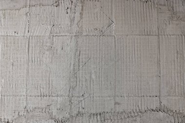 Duvardaki seramik fayanslar için hazırlanan yapıştırıcı karışım, üst görünüm