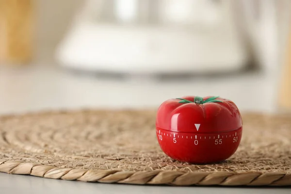 stock image Kitchen timer in shape of tomato on table indoors. Space for text