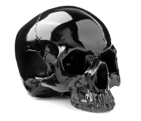 白に隔離された黒い光沢のある人間の頭蓋骨 — ストック写真