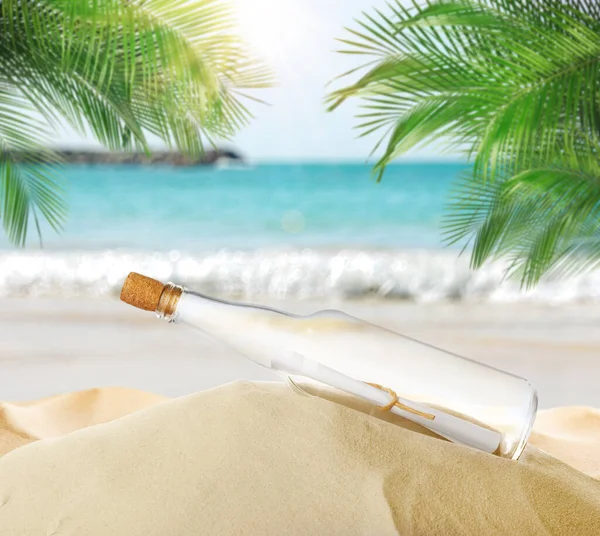 Corked Glass Bottle Rolled Paper Note Sandy Beach Palms Ocean — Stock Photo, Image