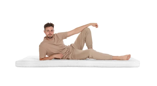 Man Lying Soft Mattress White Background — Stock Photo, Image