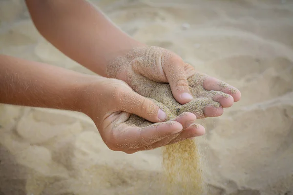 Child Pouring Sand Hands Beach Closeup Fleeting Time Concept — Fotografia de Stock