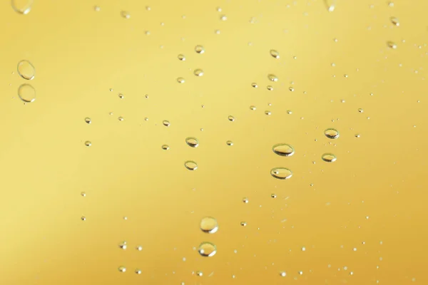 Many Serum Drops Mirror Toned Yellow — Stock Photo, Image