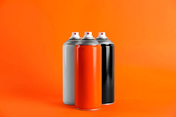 Colorful Cans Spray Paints Orange Background — Stock Photo, Image