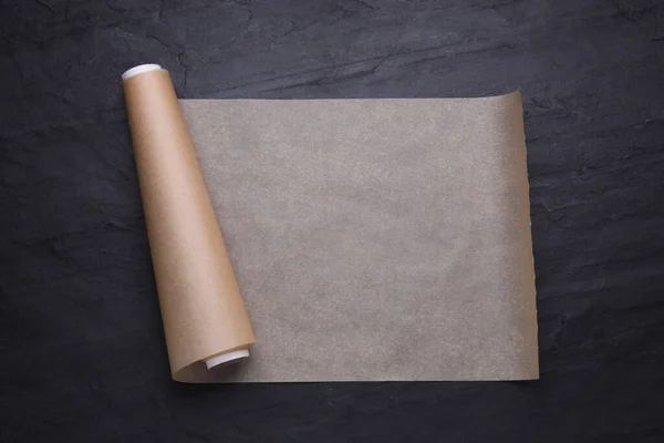 Roll Baking Paper Black Table Top View — Stock Photo, Image
