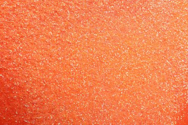 Mercan zemin üzerinde parlak parlak parıltı, düz yatıyordu.