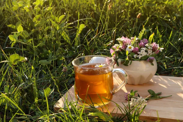 Cup Aromatic Herbal Tea Ceramic Mortar Different Wildflowers Green Grass — Stock Photo, Image
