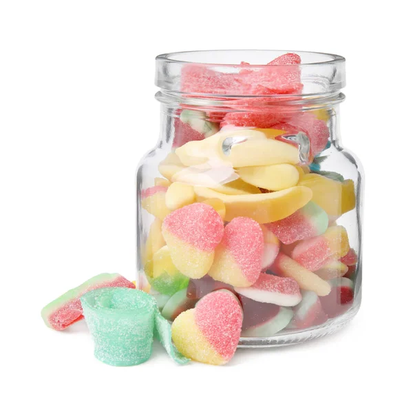 Tasty jelly candies with jar on white background