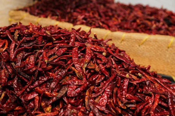 stock image Pile of spicy dried red chili peppers at market