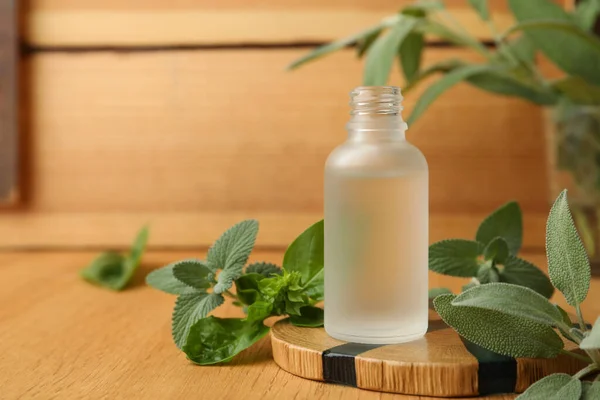 Bottle Essential Oil Fresh Herbs Wooden Table Space Text — Fotografia de Stock