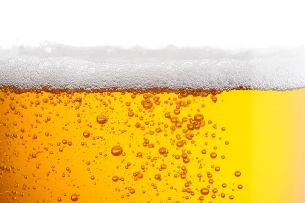 stock image Tasty beer with foam in glass, closeup