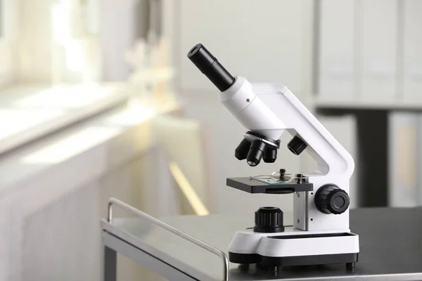 Modern Medical Microscope Metal Table Laboratory Space Text — Stok fotoğraf