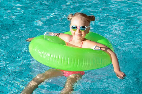 Happy Little Girl Inflatable Ring Outdoor Swimming Pool Sunny Day —  Fotos de Stock