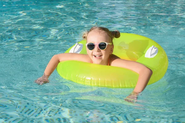 Happy Little Girl Inflatable Ring Outdoor Swimming Pool Sunny Day — Stockfoto