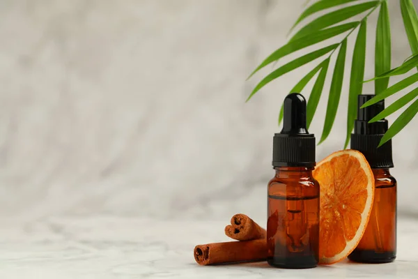 Bottles Organic Cosmetic Products Cinnamon Sticks Dried Orange Slice Green — Φωτογραφία Αρχείου