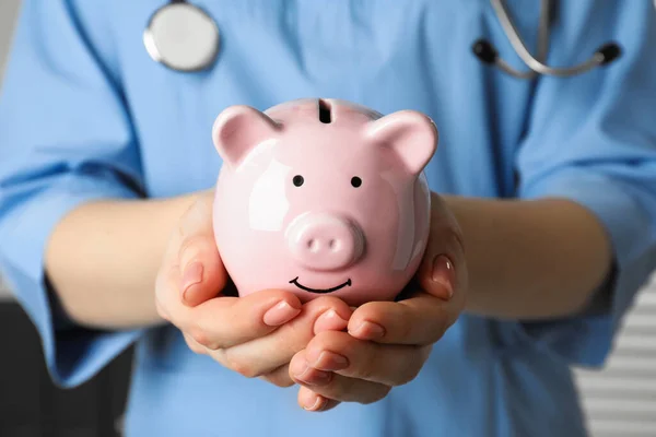 Doctor Holding Piggy Bank Hands Closeup Medical Insurance — Stock Photo, Image