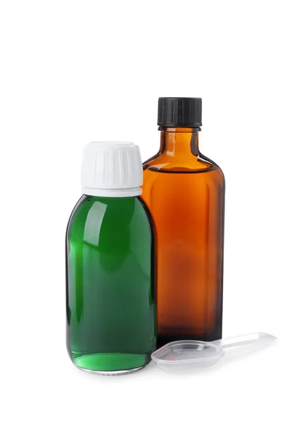 Botellas Jarabes Con Cuchara Plástico Sobre Fondo Blanco Medicina Para — Foto de Stock