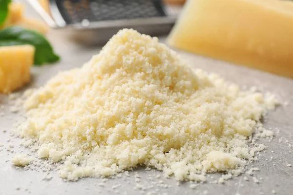 Pile Grated Parmesan Cheese Light Table Closeup — Stock Fotó