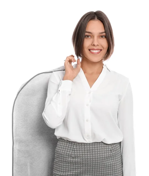 Woman holding garment cover with clothes on white background. Dry-cleaning service
