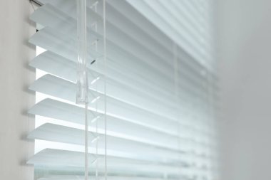 Closeup view of stylish horizontal window blinds