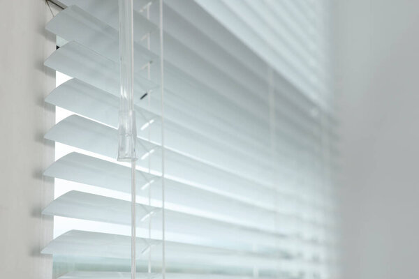 Closeup view of stylish horizontal window blinds