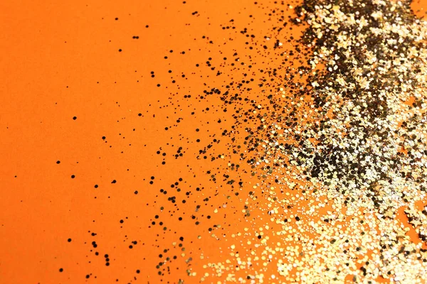 Glanzende Heldere Gouden Glitter Een Bleke Oranje Achtergrond Ruimte Voor — Stockfoto