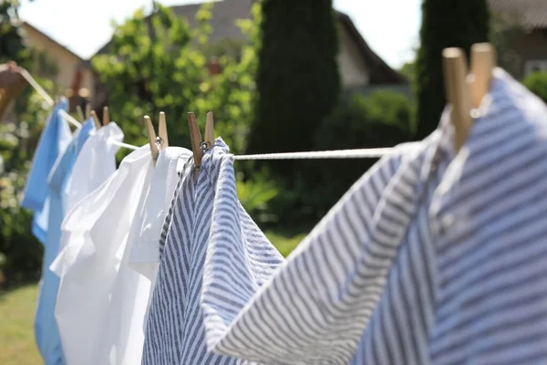 Clean Clothes Hanging Washing Line Garden Closeup Drying Laundry — Stock fotografie