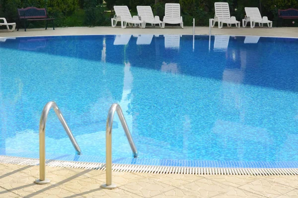 Outdoor Swimming Pool Ladder Handrails Sunny Day — Stockfoto