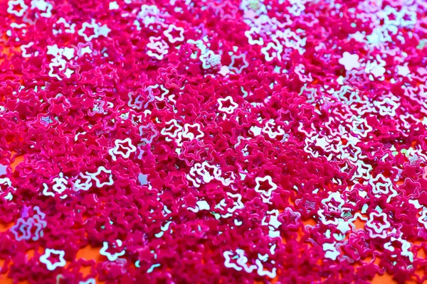 Shiny bright pink glitter as background, closeup