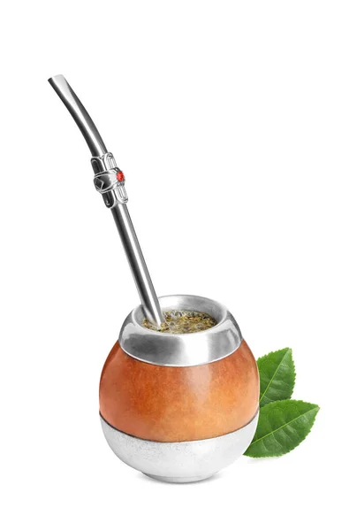 stock image Calabash with mate tea, bombilla and green leaves on white background