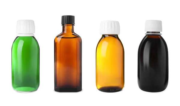 stock image Set with bottles of cough syrup on white background