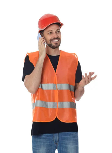 白い背景を背景に電話で均一な話をする男性工業技術者 — ストック写真