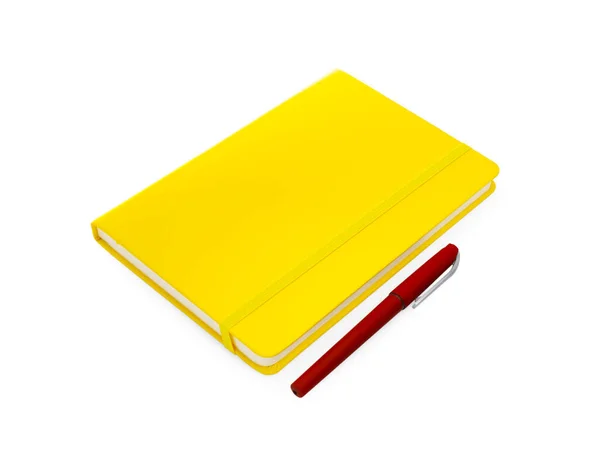 Caderno Amarelo Fechado Com Caneta Isolada Branco — Fotografia de Stock