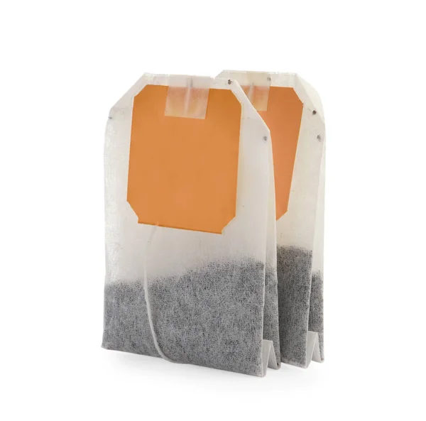 New tea bags with tabs on white background