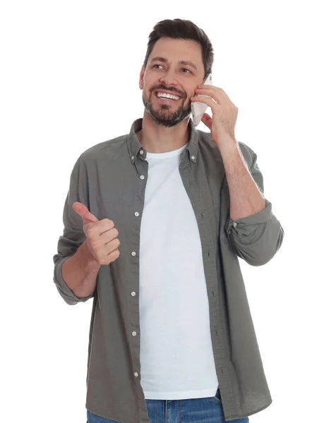 Man Pratar Telefon Mot Vit Bakgrund — Stockfoto