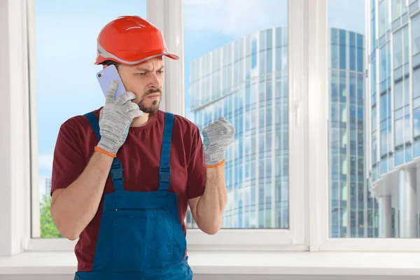 Professional Repairman Uniform Talking Phone Indoors Space Text — Stock Photo, Image