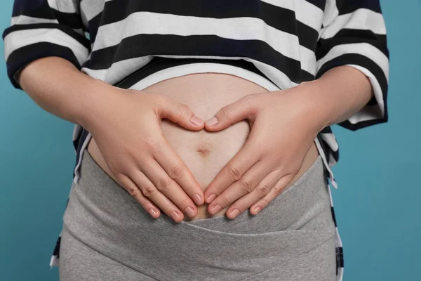 Pregnant Woman Light Blue Background Closeup — Photo