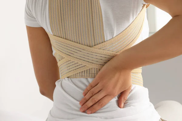 Closeup shot of an orthopedic lumbar support corset, posture corrector for  back Stock Photo - Alamy