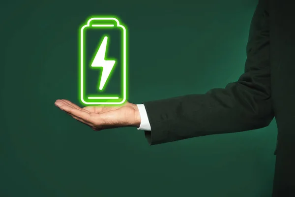 Businessman Demonstrating Icon Charging Battery Color Background Closeup — Stock Photo, Image