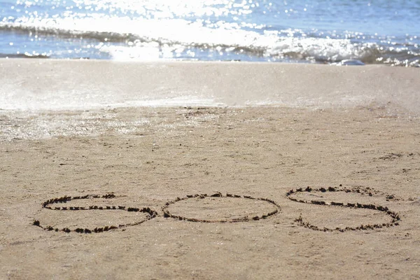 stock image SOS message written on sand near sea