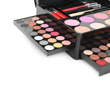 Large makeup case with different decorative cosmetics on white background