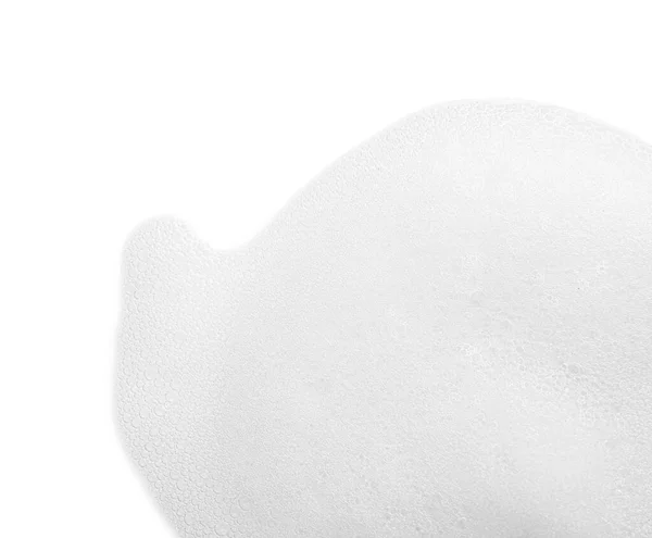 白い背景にふわふわの石鹸泡 トップビュー — ストック写真