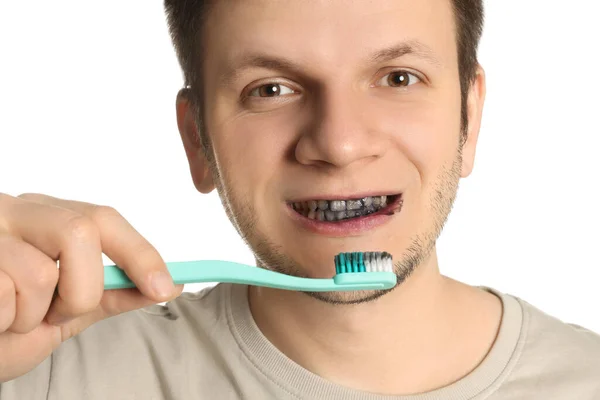 Man Brushing Teeth Charcoal Toothpaste White Background Closeup — Stock Photo, Image
