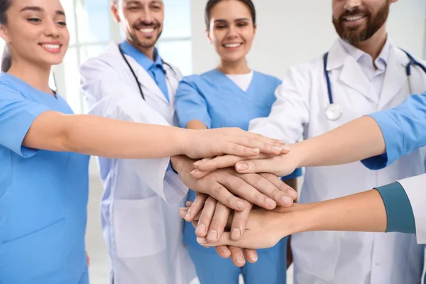 Team Medical Doctors Putting Hands Together Indoors Closeup — Stock Photo, Image