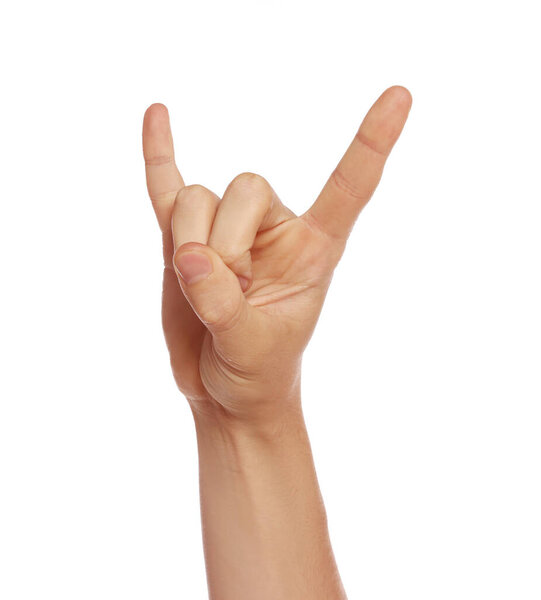 Man showing rock gesture on white background, closeup